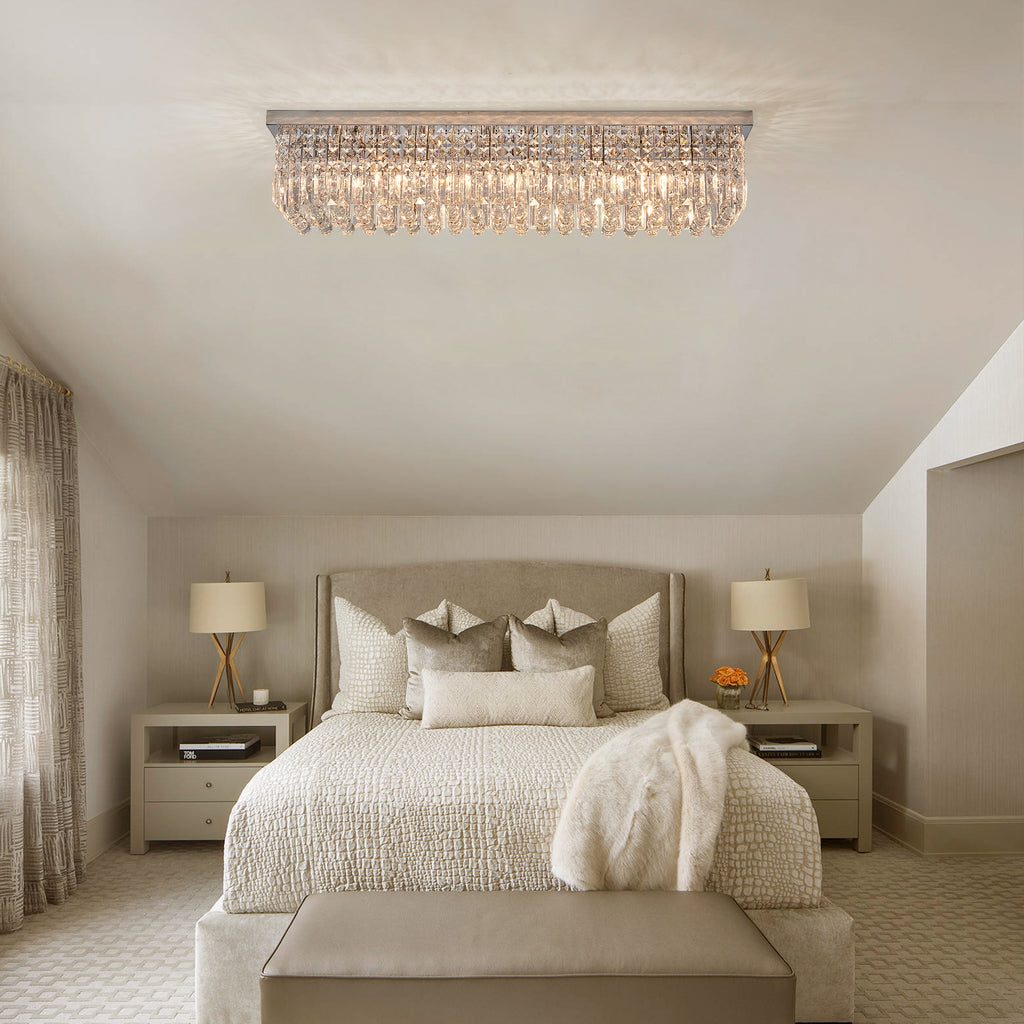 Premium Photo  A bedroom with a large chandelier hanging from the ceiling  and a mirror above it.